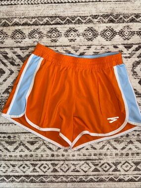Brooks Orange Athletic Shorts with Light Blue Panels